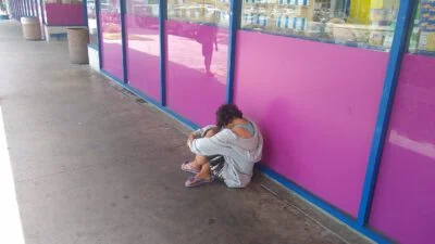 Homeless suffering next to a 99 cent only store